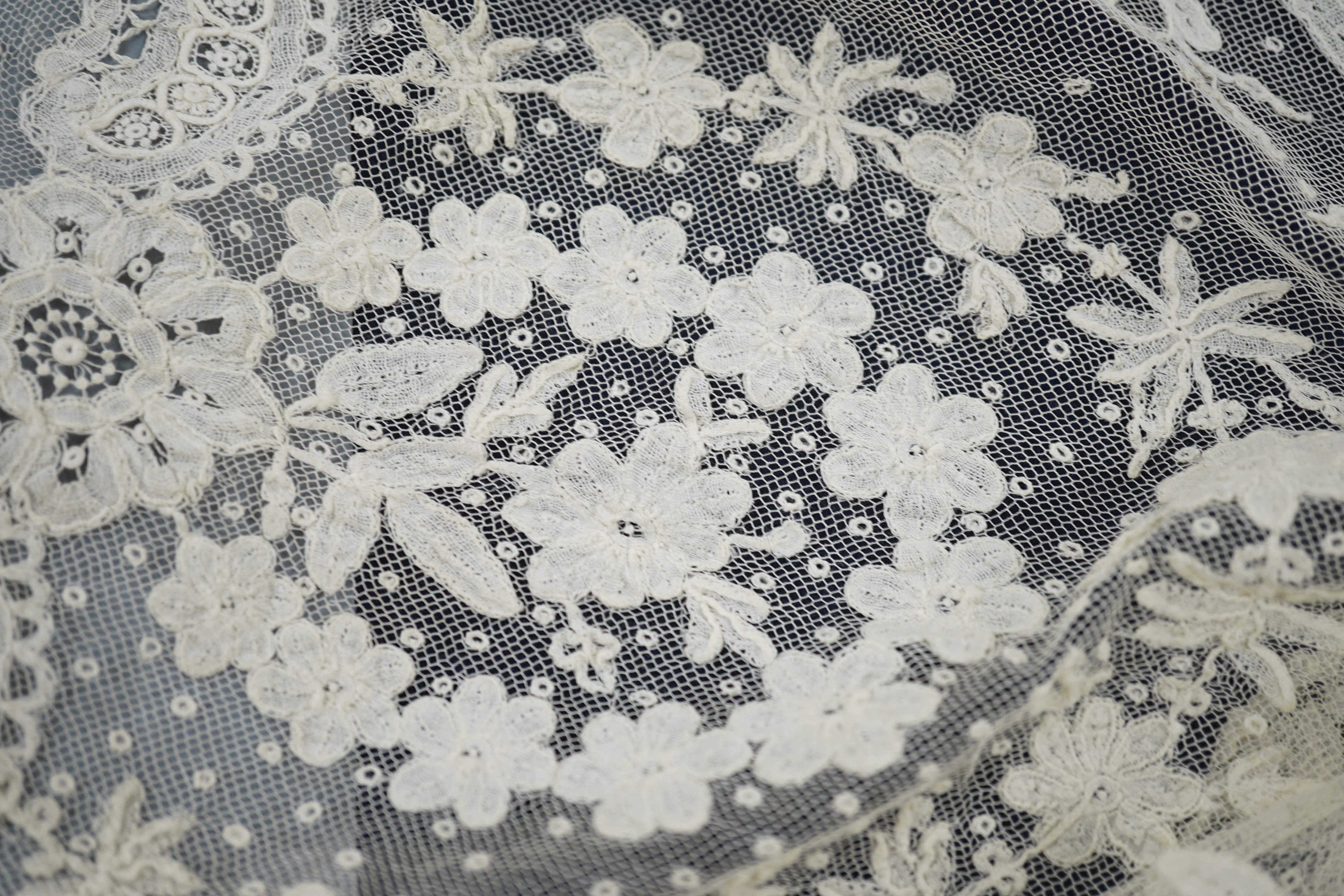 A mixed Brussels lace berth with fine needle lace floral insertions, together with a mixed bobbin veil and needleworked Brussels stols